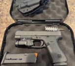 Glock 48 MOS with extras. 